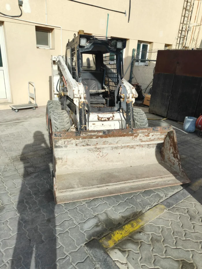 Heavy crane lifting precast concrete panel