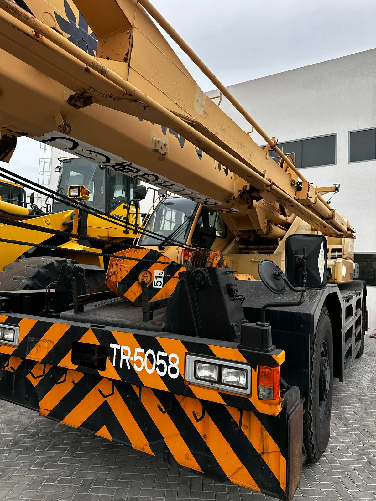 Large construction shovel moving dirt