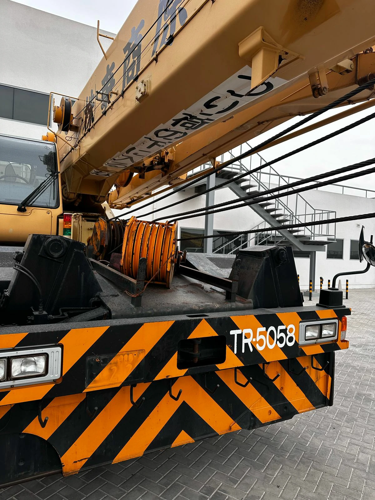 Excavator breaking ground for project