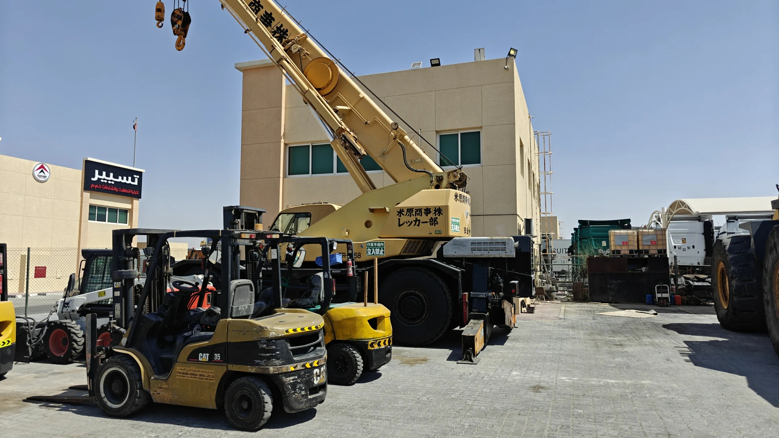 Industrial crane lifting concrete slab