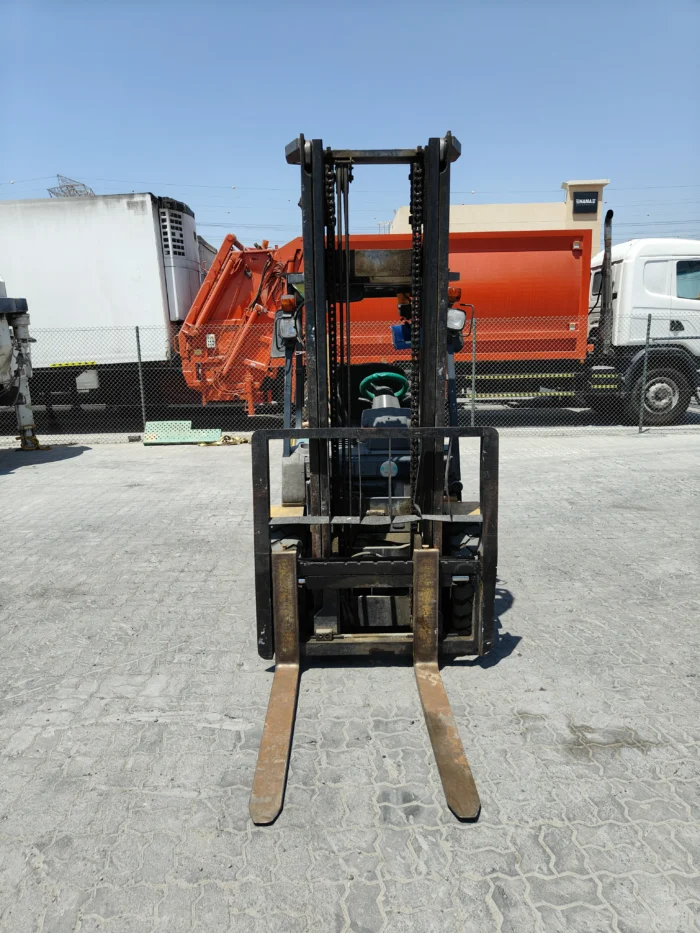 Used crane with extended boom arm