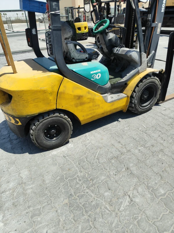 Heavy equipment fleet at construction yard